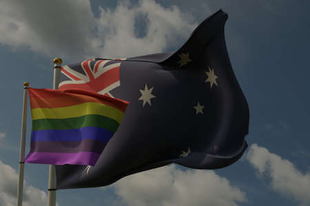 LGBT flag and Australian flag on a pole waving in the wind together representing rights and pride....