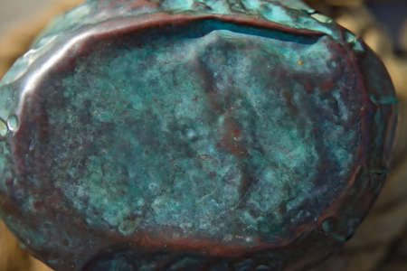 Old banged up wooden maritime bollard with copper topping.の写真素材