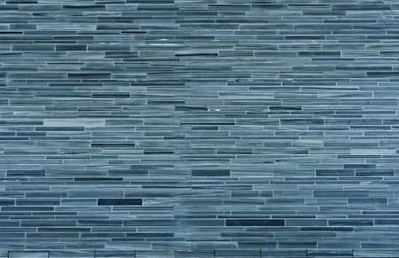 Slab stone tiles on a wall for a modern and futuristic look.の写真素材