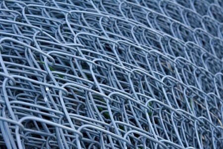 Close up of a roll of galvanized wire mesh fence. . High quality photoの写真素材