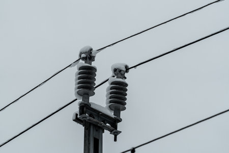 Close up of a large isolator on a power line for electric passenger trains. High quality photoの写真素材