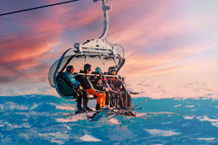 Large group of skiers together on a winter holiday in an alpine skiing resort. Children and adults.のeditorial素材