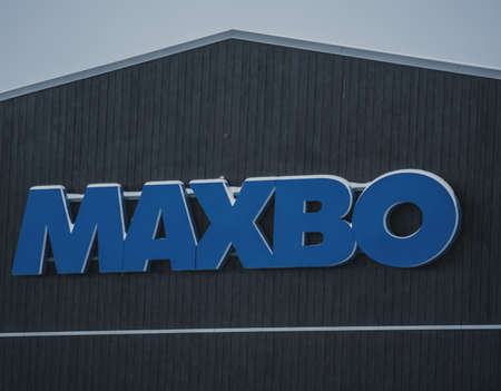 MAXBO hardware and building materials warehouse logo on a shop facade. High quality photoのeditorial素材