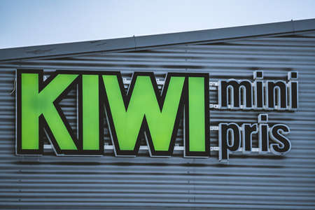 Sign of the Norwegian KIWI grocery store on a shop facade. High quality photoのeditorial素材