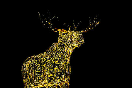 Elk or moose sculpture made from chains of Christmas lights on a wireframe. Isolated on black.の写真素材