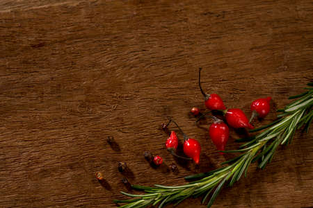 peppers on rustic wood,  with space for text , top view, background.の写真素材