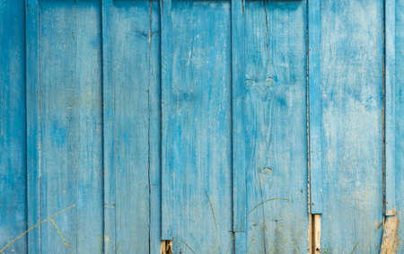 Aged rustic wooden background texture in blueの写真素材