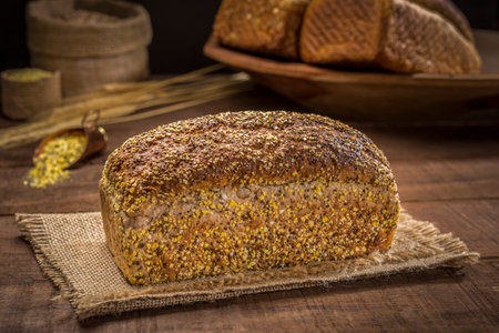 grain loaf bread on rustic wooden table