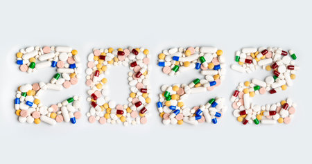 number 2022 written with pills