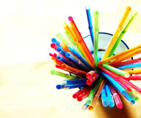 Multicolored straws with swallow DOFの写真素材