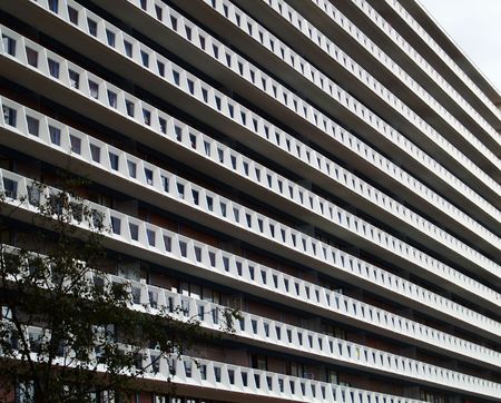 A white residential tower building