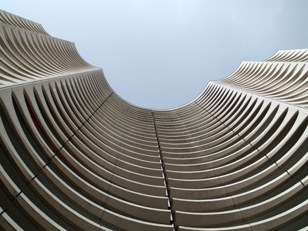 A white residential tower building