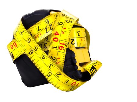 Yellow measuring tape isolated on a white backgroundの写真素材
