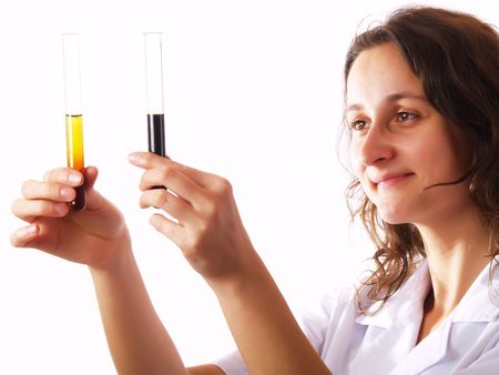 Scientist looking at a test tube in a laboratory
