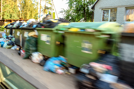 Row of bins. Motion blur View from the moving car windowのeditorial素材