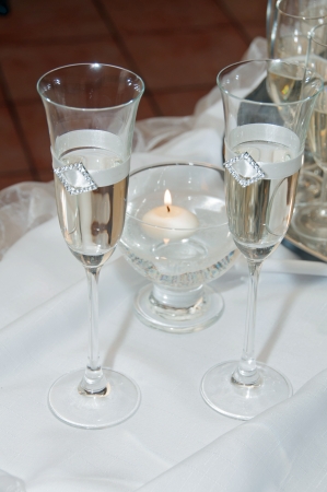 Glasses on the table to toastの写真素材