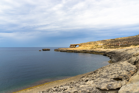 The Azure Window is Gozo's iconic flat-topped natural rock arch over the sea at Dwejra.の写真素材