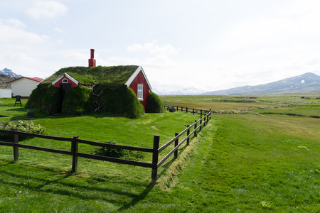 Red turf house Lindarbakki in Bakkagerdi on the east coast of Icelandのeditorial素材