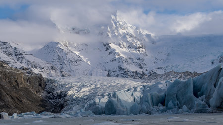 Svinafellsjokull is an outlet glacier of Vatnajokull, the largest ice cap in Europe. The glacier lagoon provides beautiful views and reflectionsの写真素材