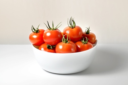 Isolated tomatoes in a platefulの写真素材