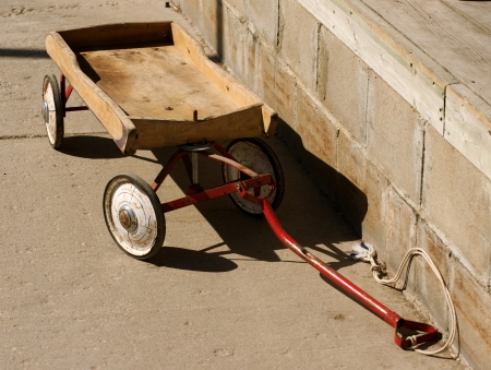 Vintage, little, wood wagon, symbolic of childhoodの写真素材