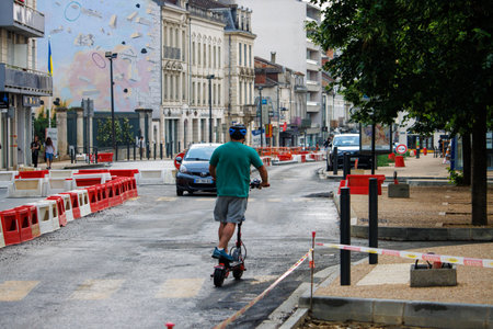Perigueux, Dordogne, France June 03 2023: Urban Mobility Redefined: The Kick Scooterのeditorial素材