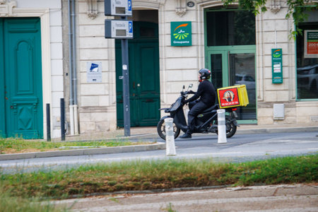 Perigueux, Dordogne, France June 032023: Zipping Through the City: Scooters on the Roadのeditorial素材