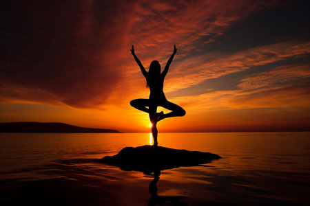 An High Contrast Fitness: Woman Doing Yoga at Sunriseの素材
