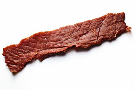 An Minimalist Food: Single Strip of Dried Beef on White Backgroundの素材