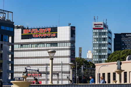 Tokyo, Japan, October 26, 2023: Urban Landscape with Billboards and Modern Architecture
