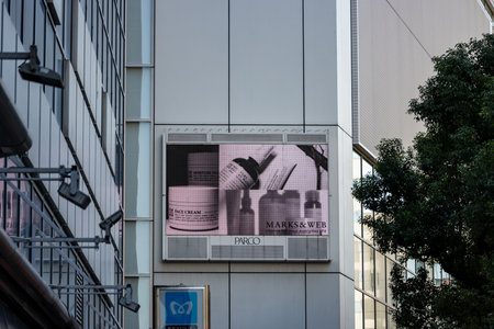 Tokyo, Japan, October 26, 2023: Advertisement on building facade in urban Tokyo