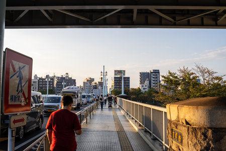 Tokyo, Japan, October 28, 2023: Pedestrian Walkway Overlooking Cityscapeのeditorial素材