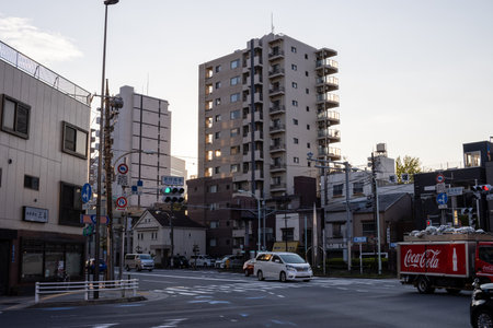 Tokyo, Japan, October 28, 2023: Urban Street Scene with Apartment Buildingsのeditorial素材