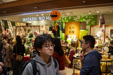 Tokyo, Japan, October 28, 2023: People Shopping in Front of a Holiday Decor Storeのeditorial素材