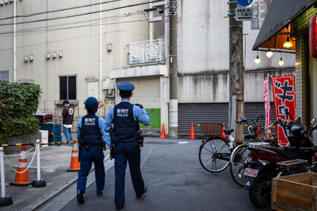 Tokyo, Japan, October 28, 2023: Police Officers Patrolling a Tokyo Streetのeditorial素材