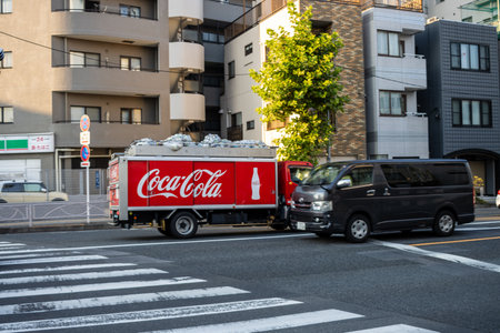 Tokyo, Japan, October 28, 2023: Coca-Cola Delivery Truck Parked by the Roadのeditorial素材