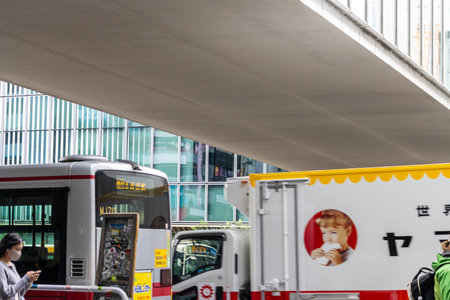 Tokyo, Japan, October 29, 2023: City buses in traffic viewed from a pedestrian overpassのeditorial素材