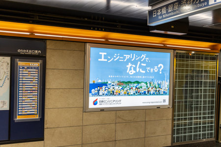Tokyo, Japan, October 29, 2023: Advertising billboard in a subway stationのeditorial素材