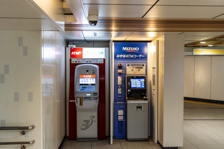 Tokyo, Japan, October 29, 2023: ATM machines in Tokyo subway stationのeditorial素材