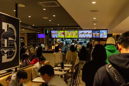 Tokyo, Japan, October 29, 2023: Interior of a fast food restaurant with ordering counterのeditorial素材
