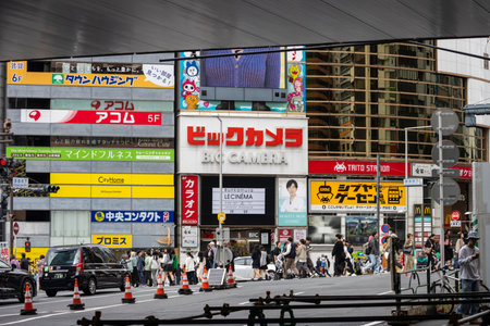 Tokyo, Japan, October 29, 2023: City street with a variety of colorful advertising billboardsのeditorial素材