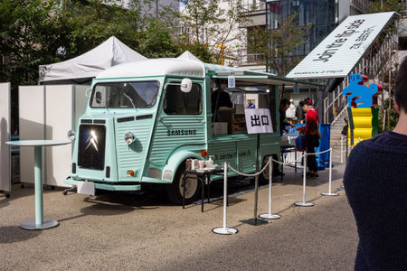 Tokyo, Japan, October 29, 2023: Food truck serving customers at an outdoor eventのeditorial素材
