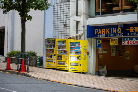 Tokyo, Japan, October 29, 2023: Automated Parking Entrance with Vending Machinesのeditorial素材
