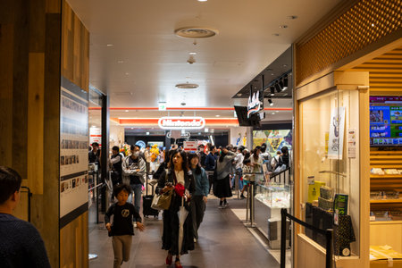 Tokyo, Japan, October 29, 2023: Busy Corridor in a Shopping Mallのeditorial素材