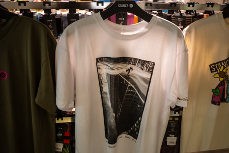 Tokyo, Japan, October 29, 2023: Graphic T-Shirts on Sale in a Clothing Storeのeditorial素材