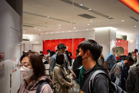 Tokyo, Japan, October 29, 2023: Customers lining up inside a Nintendo store for a new releaseのeditorial素材