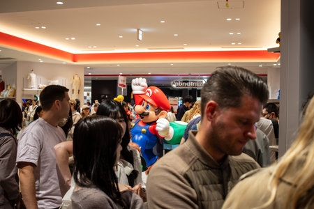 Tokyo, Japan, October 29, 2023: Crowded Nintendo store with Mario statue during a special eventのeditorial素材