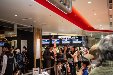 Tokyo, Japan, October 29, 2023: Interior of a Nintendo store with customers and gaming displaysのeditorial素材
