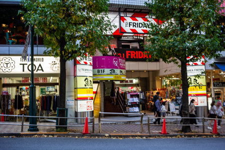 Tokyo, Japan, October 29, 2023: Exterior of a TGI FRIDAYS restaurant in a busy streetのeditorial素材