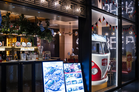 Tokyo, Japan, October 29, 2023: Decorated storefront of a cafe with a vintage van themeのeditorial素材
